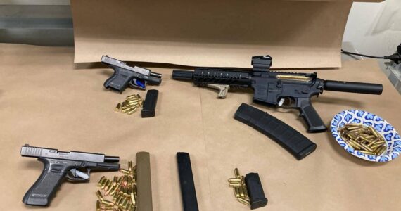 Three firearms and magazines retrieved from the suspect’s home and vehicle. (Photo courtesy of Auburn Police Department)