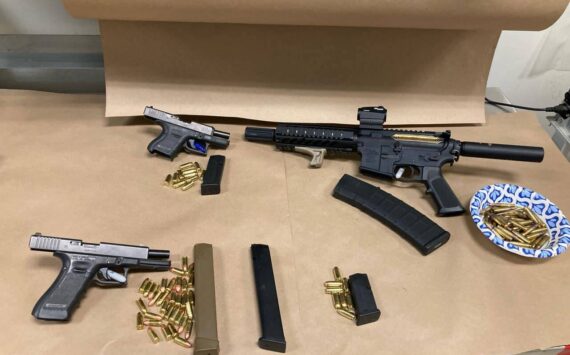 Three firearms and magazines retrieved from the suspect’s home and vehicle. (Photo courtesy of Auburn Police Department)