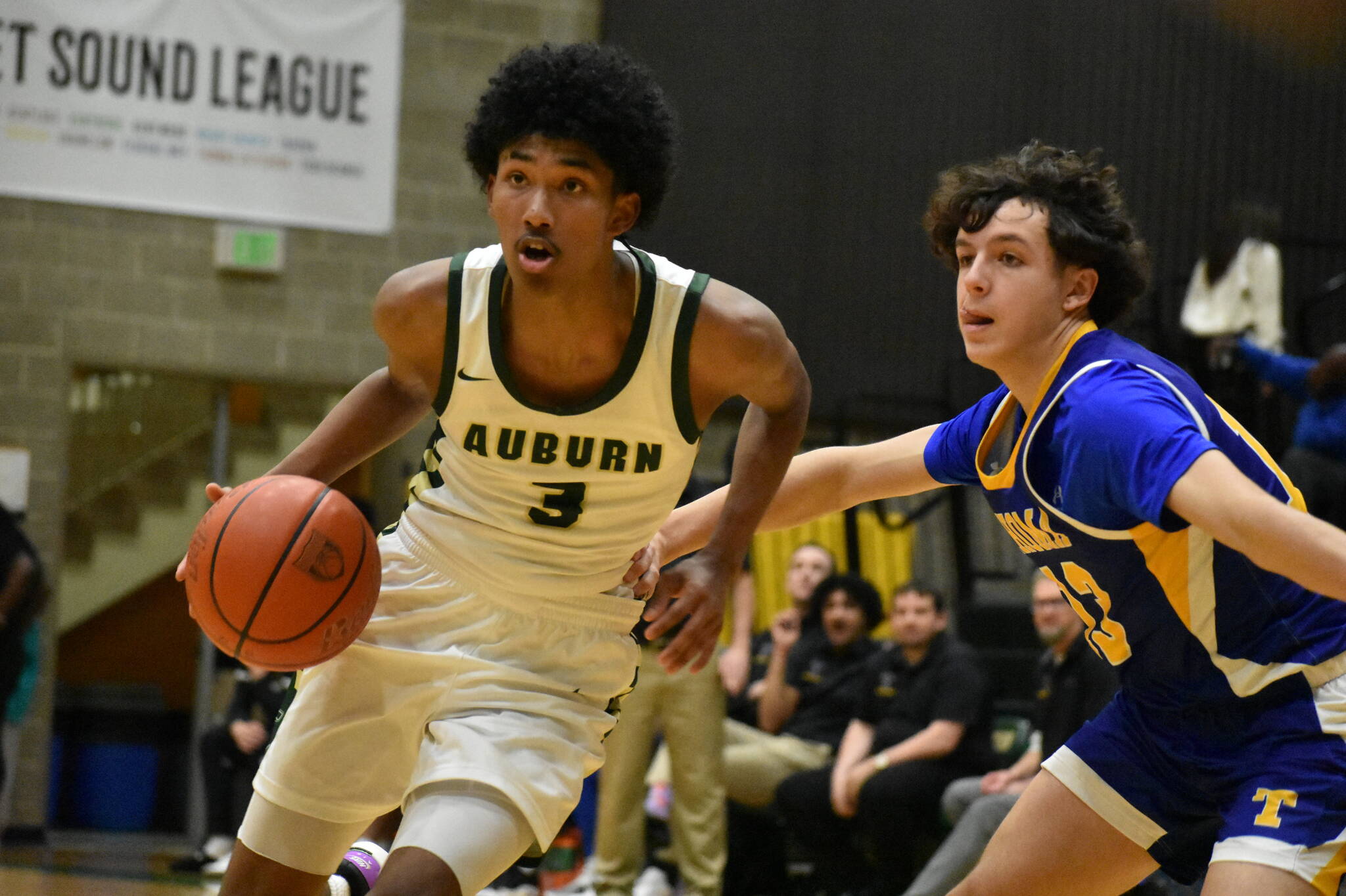 Photos by Ben Ray / The Reporter
Trojan junior Daniel Johnson drives to the basket.