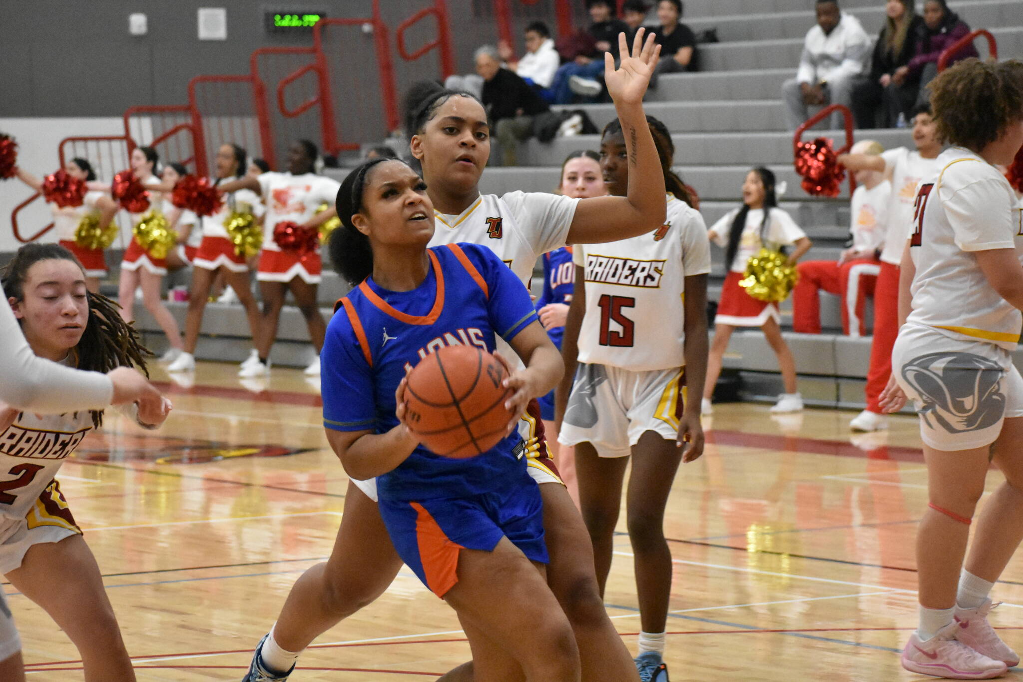 Kyra Thomas makes a layup against Thomas Jefferson. Photos by Ben Ray / The Reporter