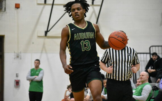 Miles Henry scored 25 points in the win for Auburn over Kentwood. Ben Ray / The Reporter