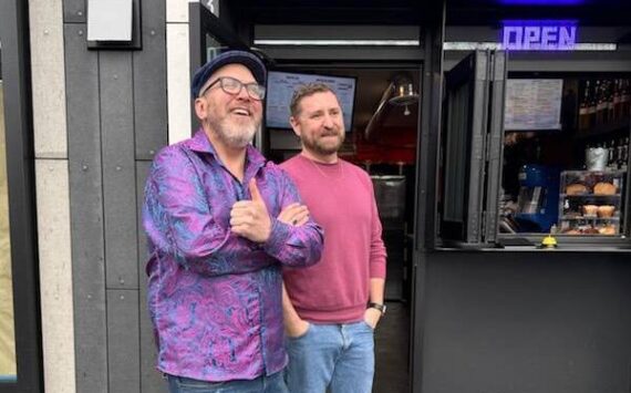 Josh Brugger and his friend and business partner Tim Larson in front of the coffee shop they opened on Jan. 5. Courtesy photo